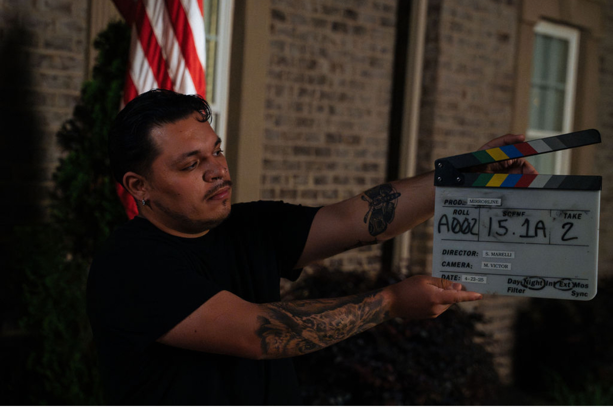 Jeremy holding the Mirrorline slate for a take.